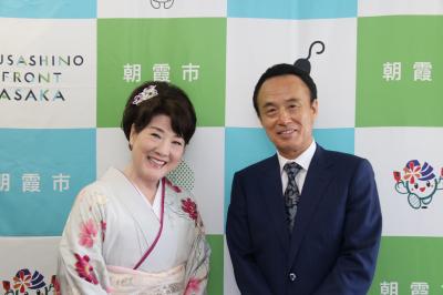 川中さんと富岡市長が写っています。