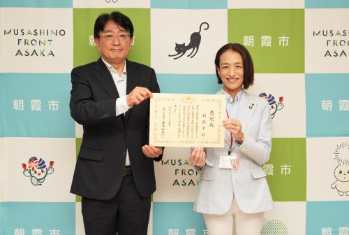 税務署長と市長の写真